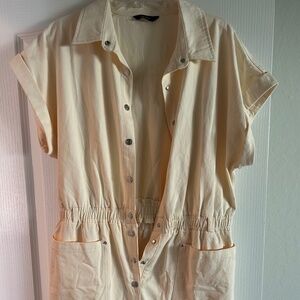 Cream colored short jumpsuit/romper